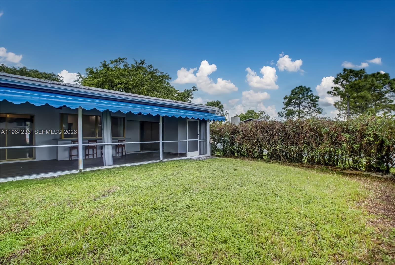4917 West Park Road Hollywood, FL 33021 - Photo 22 of 25 a view of a house with backyard and garden