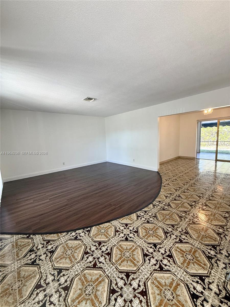 4917 West Park Road Hollywood, FL 33021 - Photo 6 of 25 a view of wooden floor