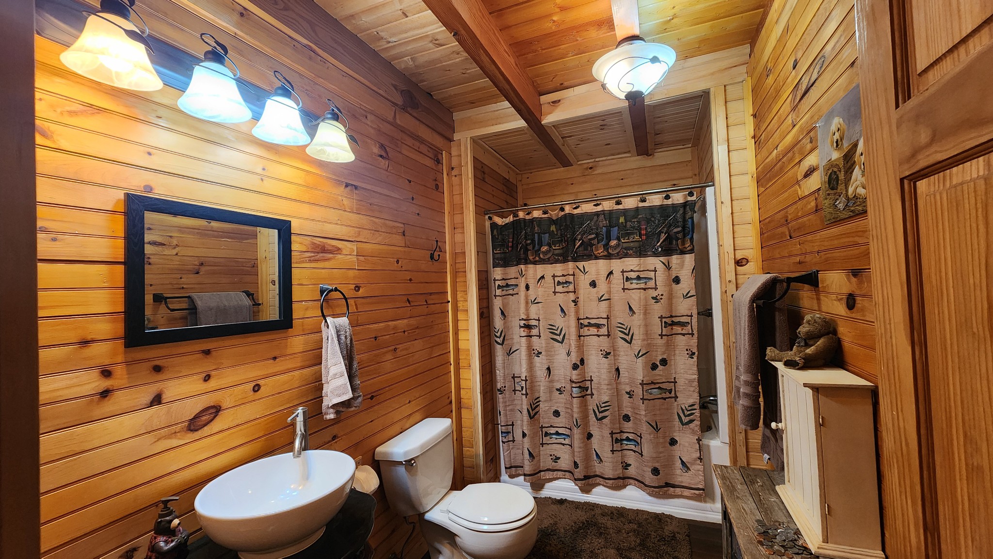 5615 Eastport Road Alpine, TN 38543 - Photo 19 of 83 a bathroom with a toilet and a shower