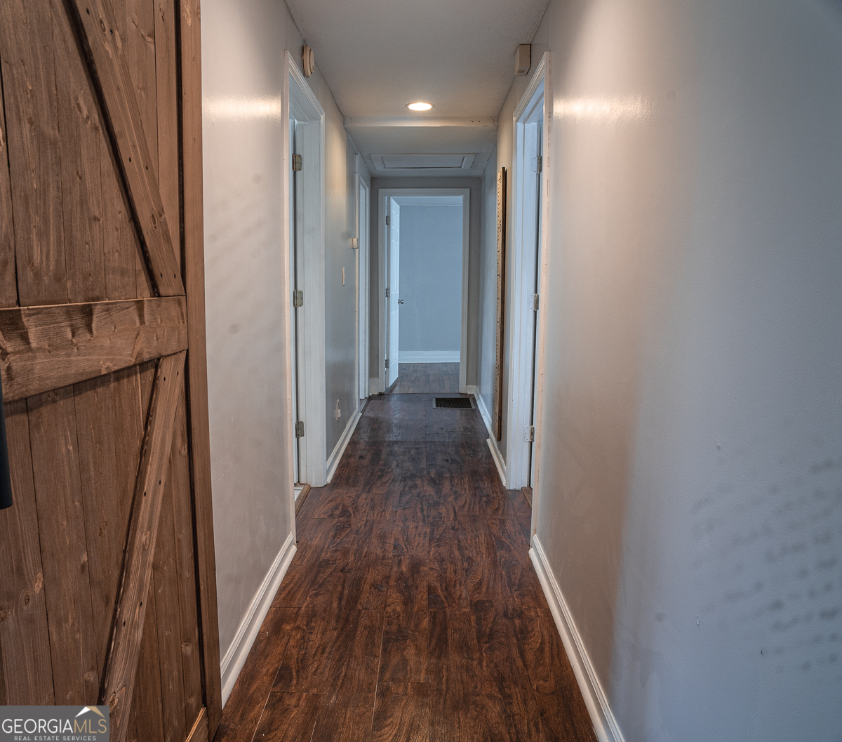 3305 Cherokee Avenue Columbus, GA 31906 - Photo 13 of 49 a view of a hallway with wooden floor and staircase