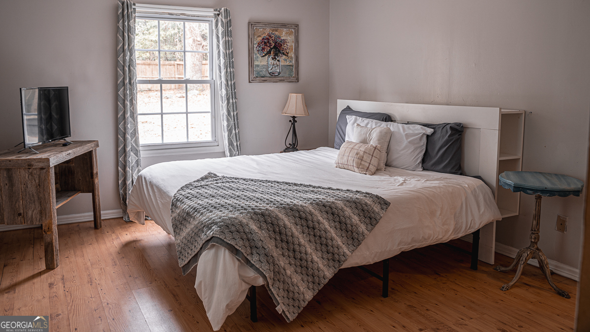 3305 Cherokee Avenue Columbus, GA 31906 - Photo 16 of 49 a bedroom with a bed and a window
