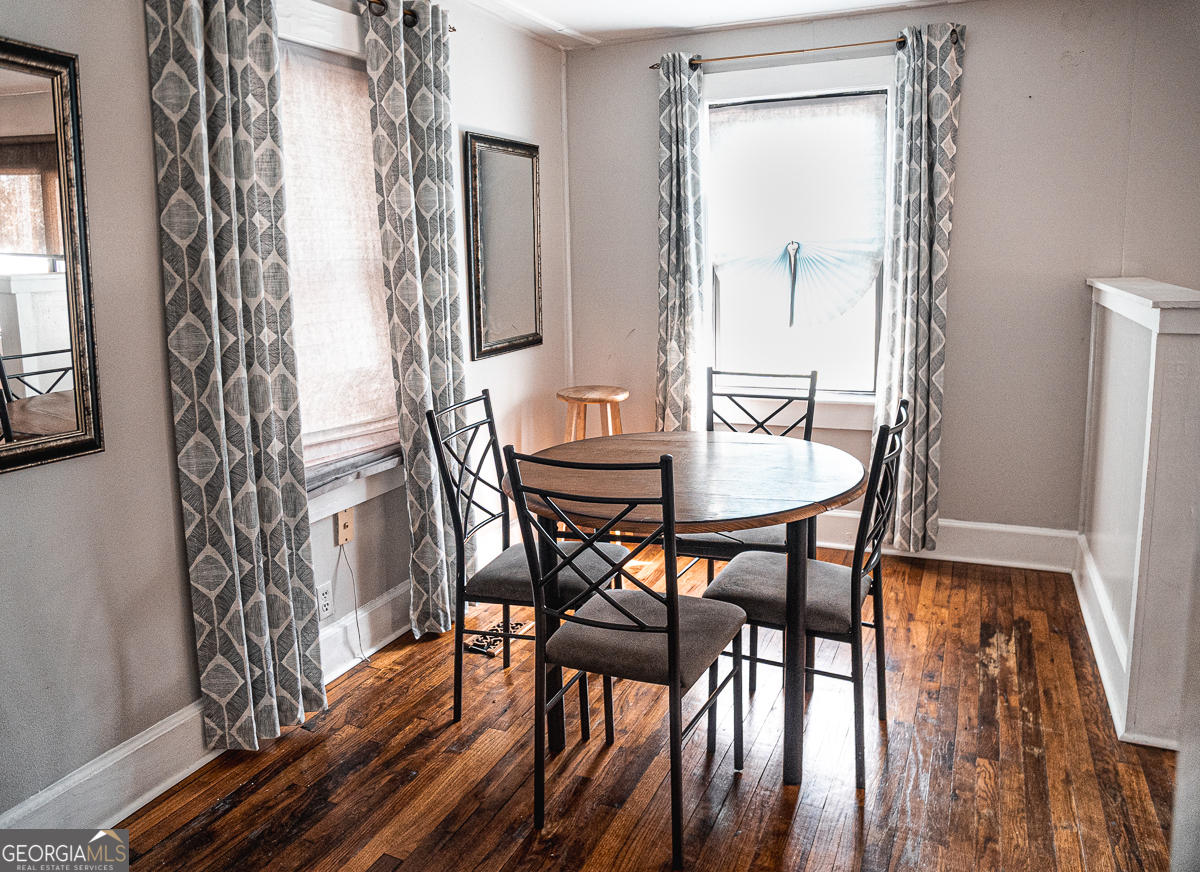 3305 Cherokee Avenue Columbus, GA 31906 - Photo 27 of 49 a view of a dining room with furniture and wooden floor