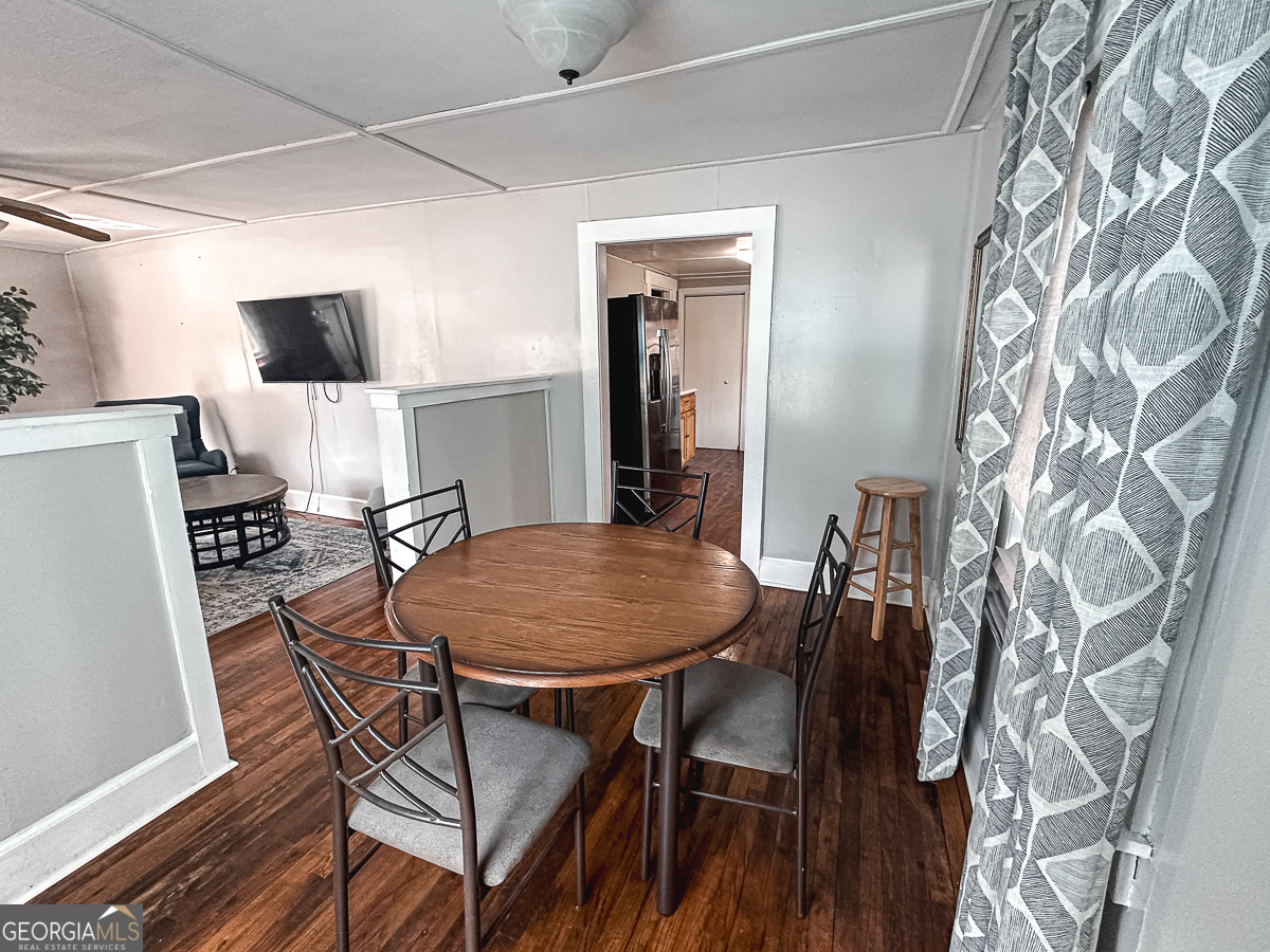 3305 Cherokee Avenue Columbus, GA 31906 - Photo 28 of 49 a view of a dining room with furniture and wooden floor
