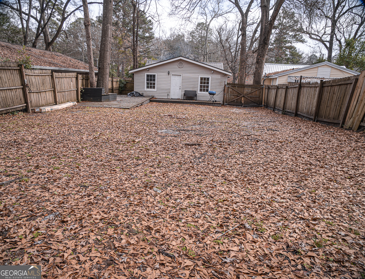 3305 Cherokee Avenue Columbus, GA 31906 - Photo 31 of 49 a white house that has a tree in front of it