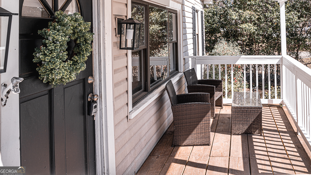 3305 Cherokee Avenue Columbus, GA 31906 - Photo 38 of 49 a view of balcony with wooden floor and seating space