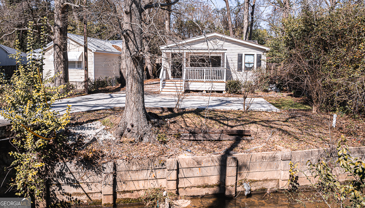 3305 Cherokee Avenue Columbus, GA 31906 - Photo 40 of 49 a front view of a house with a yard
