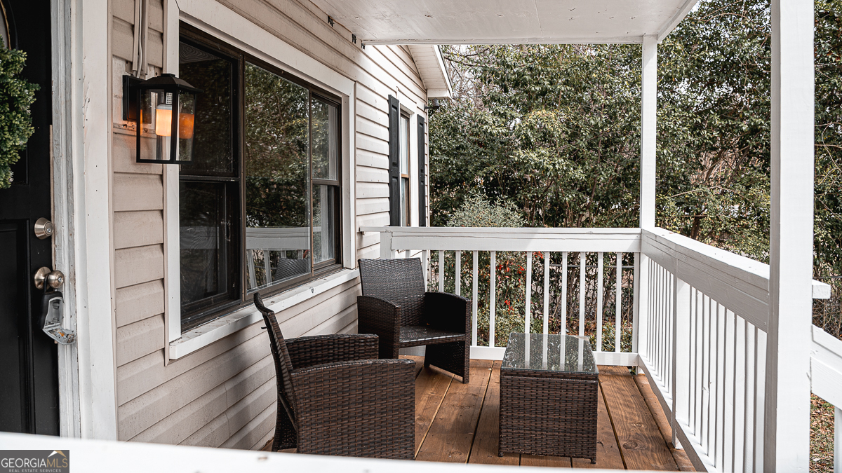 3305 Cherokee Avenue Columbus, GA 31906 - Photo 46 of 49 a view of two chairs in the balcony