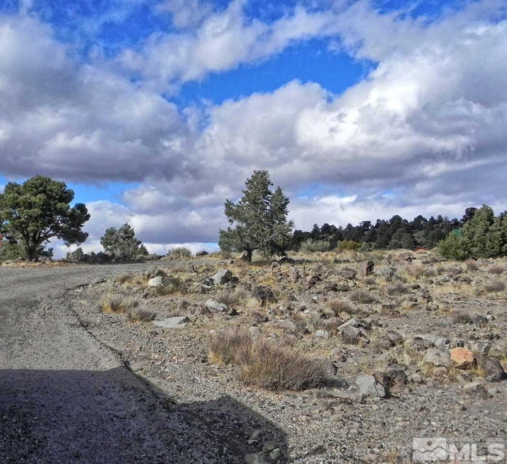 4160 Palisade Road, Unit 416 Reno, NV 89521 - Photo 3 of 11 a view of a dry yard with wooden fence