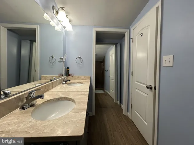 a view of a house with backyard and porch