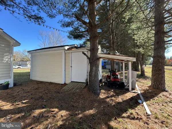 a view of a back yard of the house