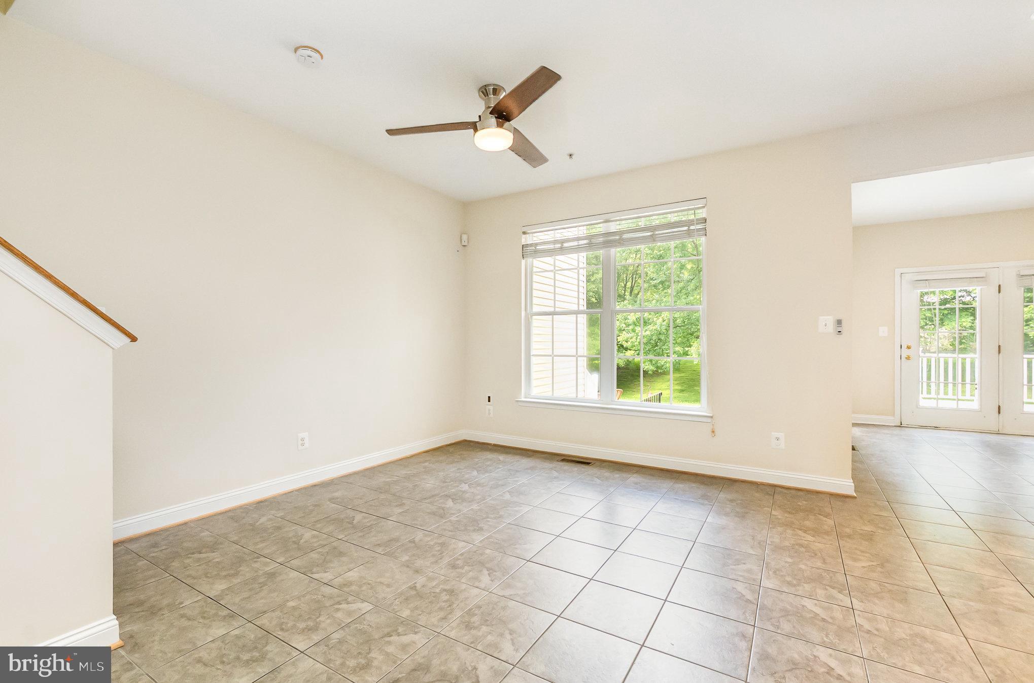 512 Callander Way Abingdon, MD 21009 - Photo 15 of 40 a view of empty room with window and ceiling fan