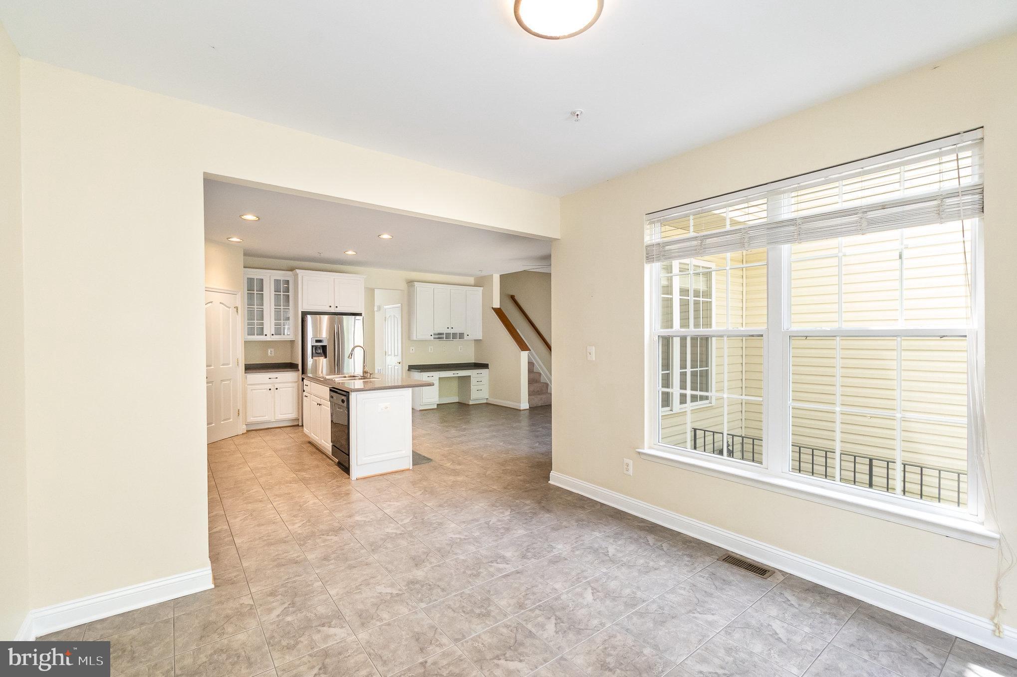 512 Callander Way Abingdon, MD 21009 - Photo 16 of 40 a view of an empty room with a window