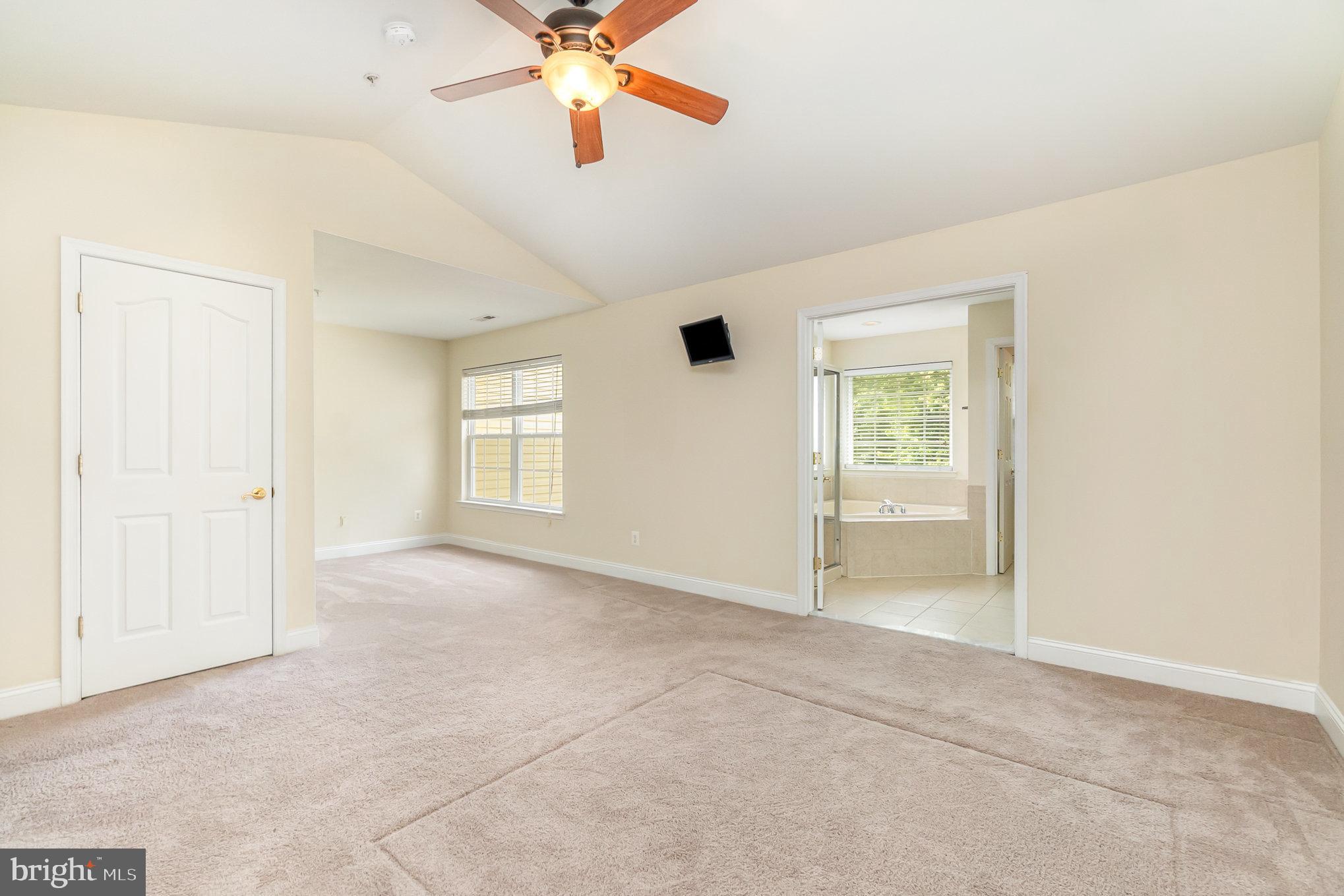 512 Callander Way Abingdon, MD 21009 - Photo 19 of 40 an empty room with windows and fan