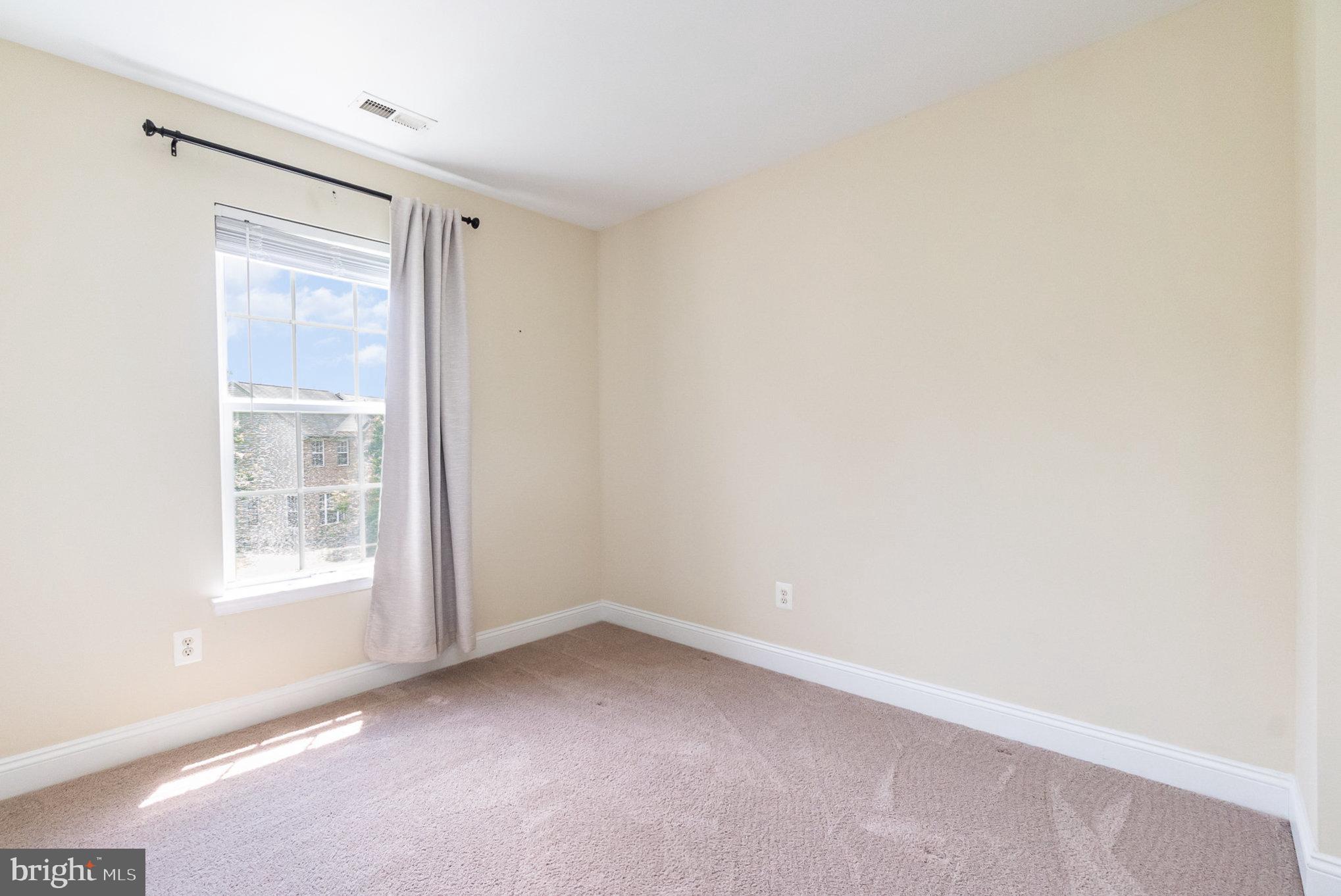 512 Callander Way Abingdon, MD 21009 - Photo 26 of 40 a view of an empty room with a window