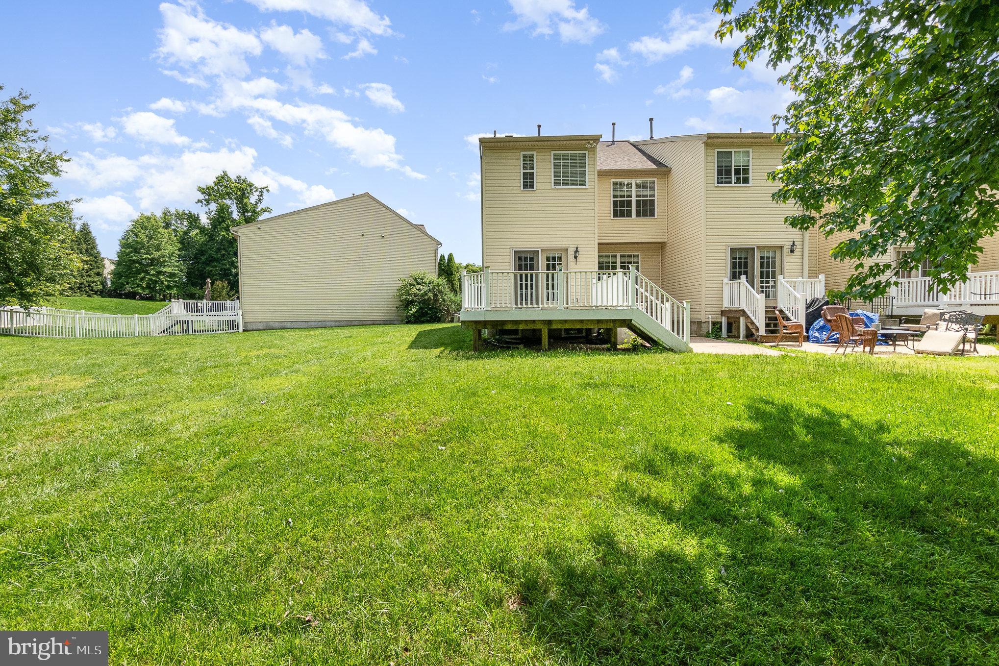 512 Callander Way Abingdon, MD 21009 - Photo 36 of 40 a view of a house with a yard and sitting area