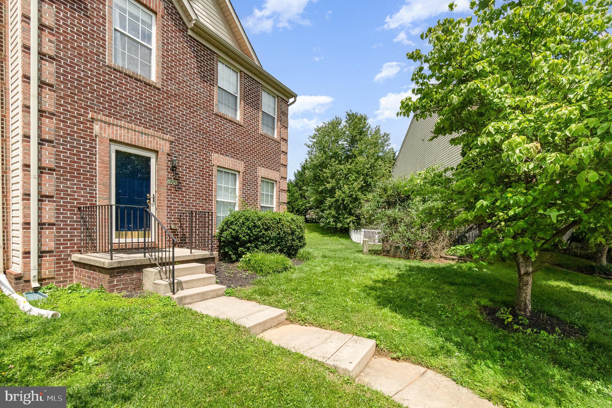 512 Callander Way Abingdon, MD 21009 - Photo 7 of 40 a front view of a house with a yard