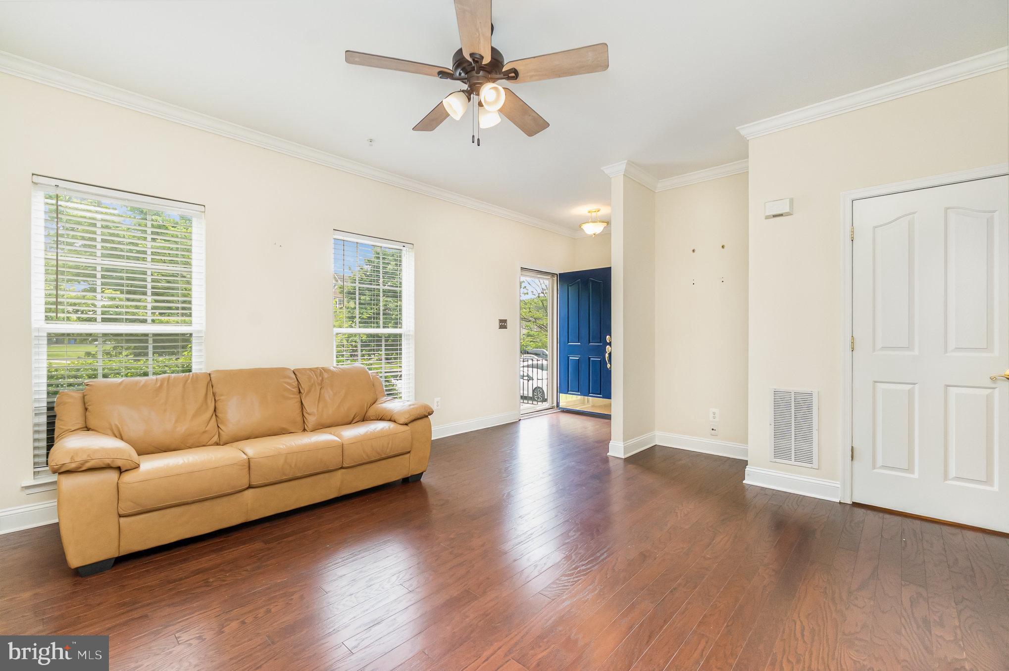 512 Callander Way Abingdon, MD 21009 - Photo 8 of 40 a living room with furniture and a large window