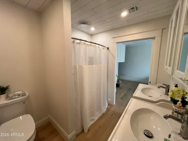 a bathroom with a sink and toilet