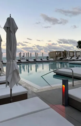 a view of outdoor space yard swimming pool and seating