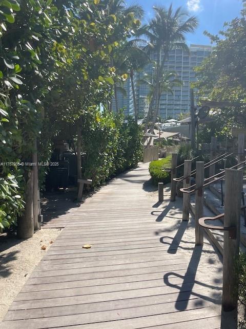 2301 Collins Avenue, Unit 921 Miami Beach, FL 33139 - Photo 45 of 45 a swimming pool with outdoor seating and yard