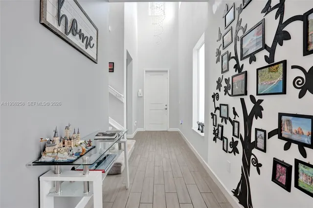 a view of a livingroom with furniture and window