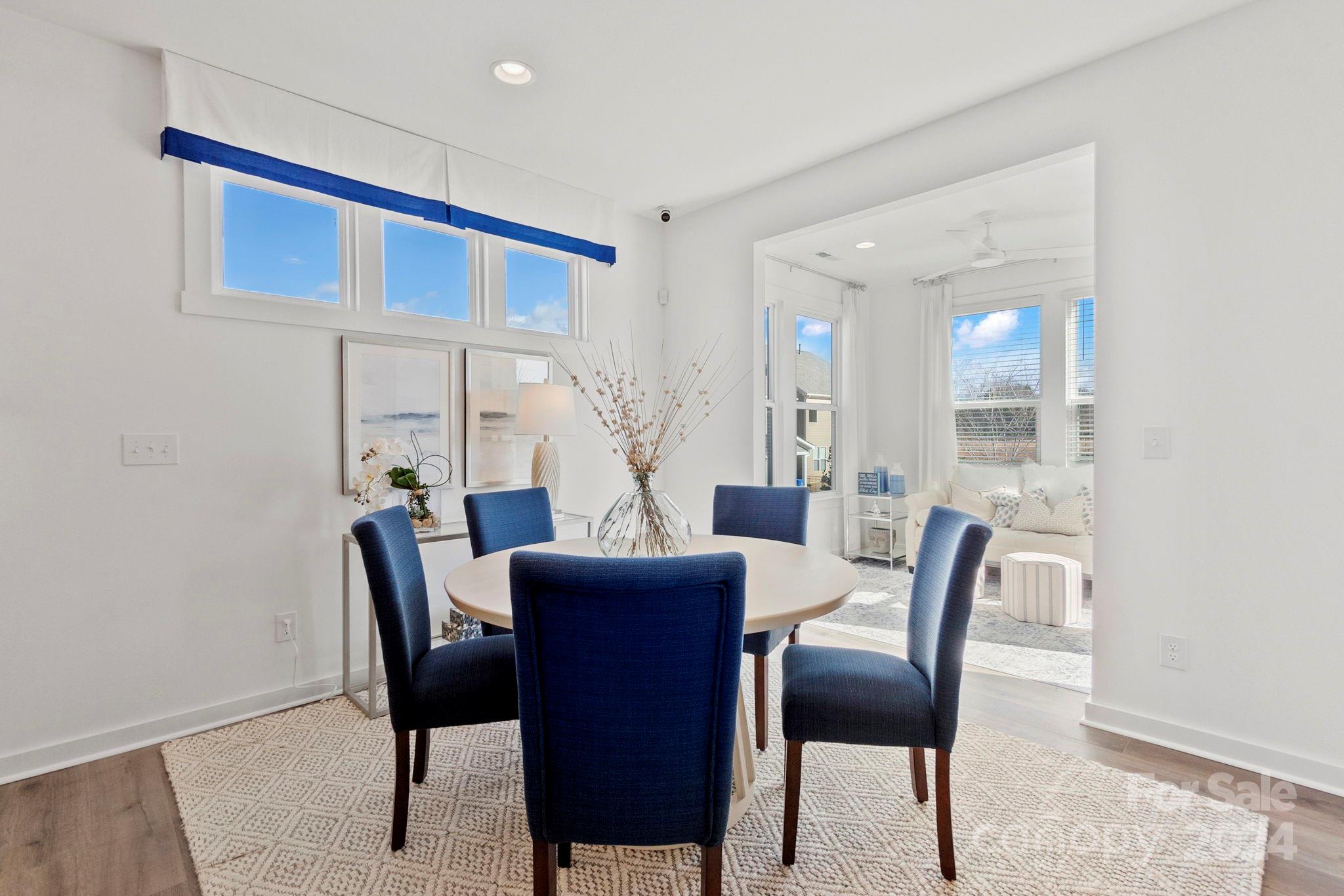 13228 Chopin Ridge Road Huntersville, NC 28078 - Photo 11 of 37 a view of a dining room with furniture