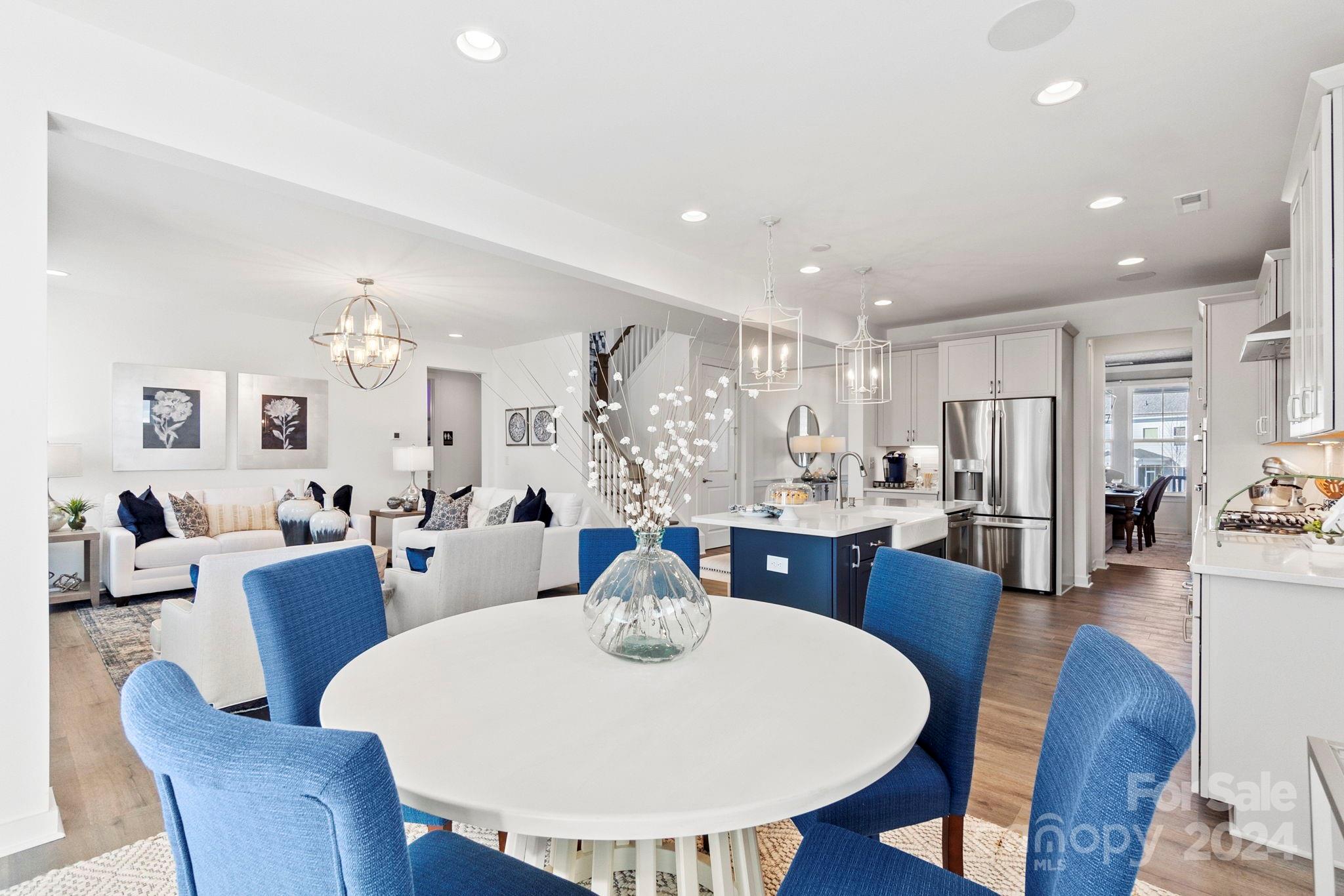 13228 Chopin Ridge Road Huntersville, NC 28078 - Photo 12 of 37 a view of a dining room with furniture