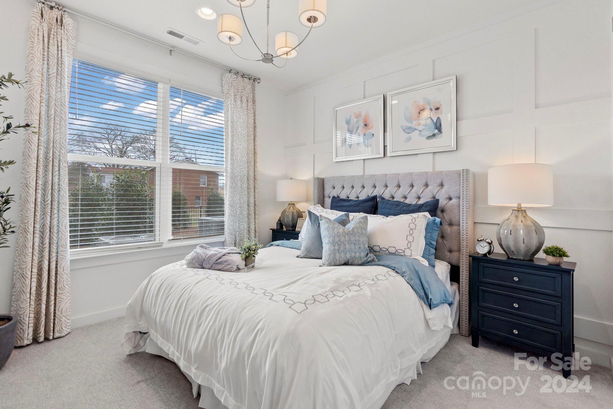 13228 Chopin Ridge Road Huntersville, NC 28078 - Photo 19 of 37 a bedroom with bed and a large window