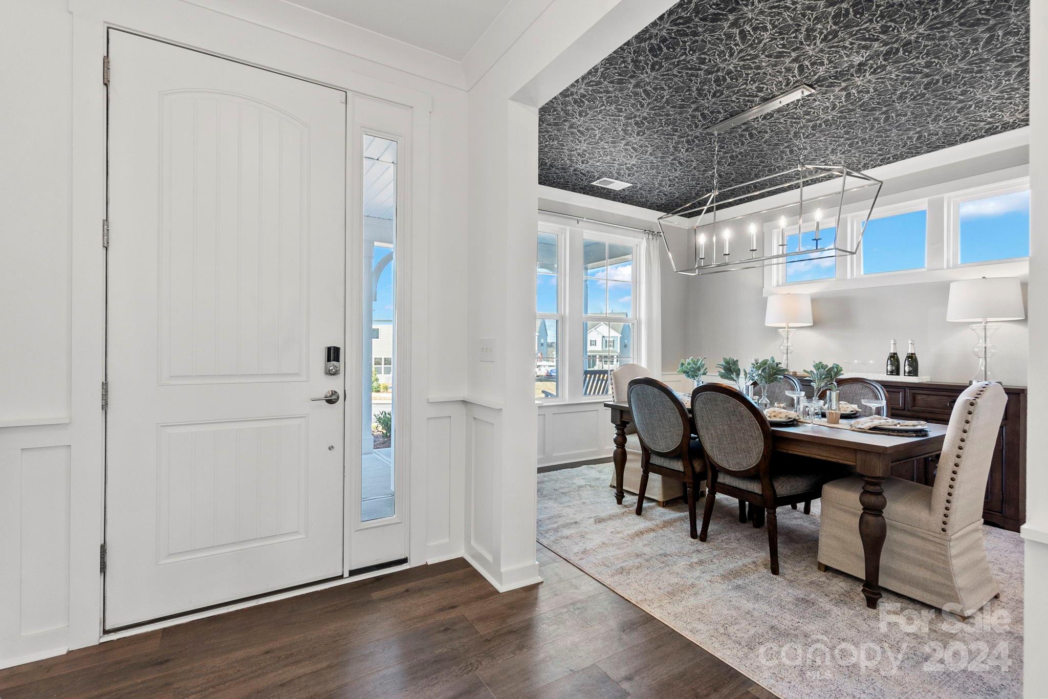 13228 Chopin Ridge Road Huntersville, NC 28078 - Photo 2 of 37 a view of a workspace with furniture and wooden floor