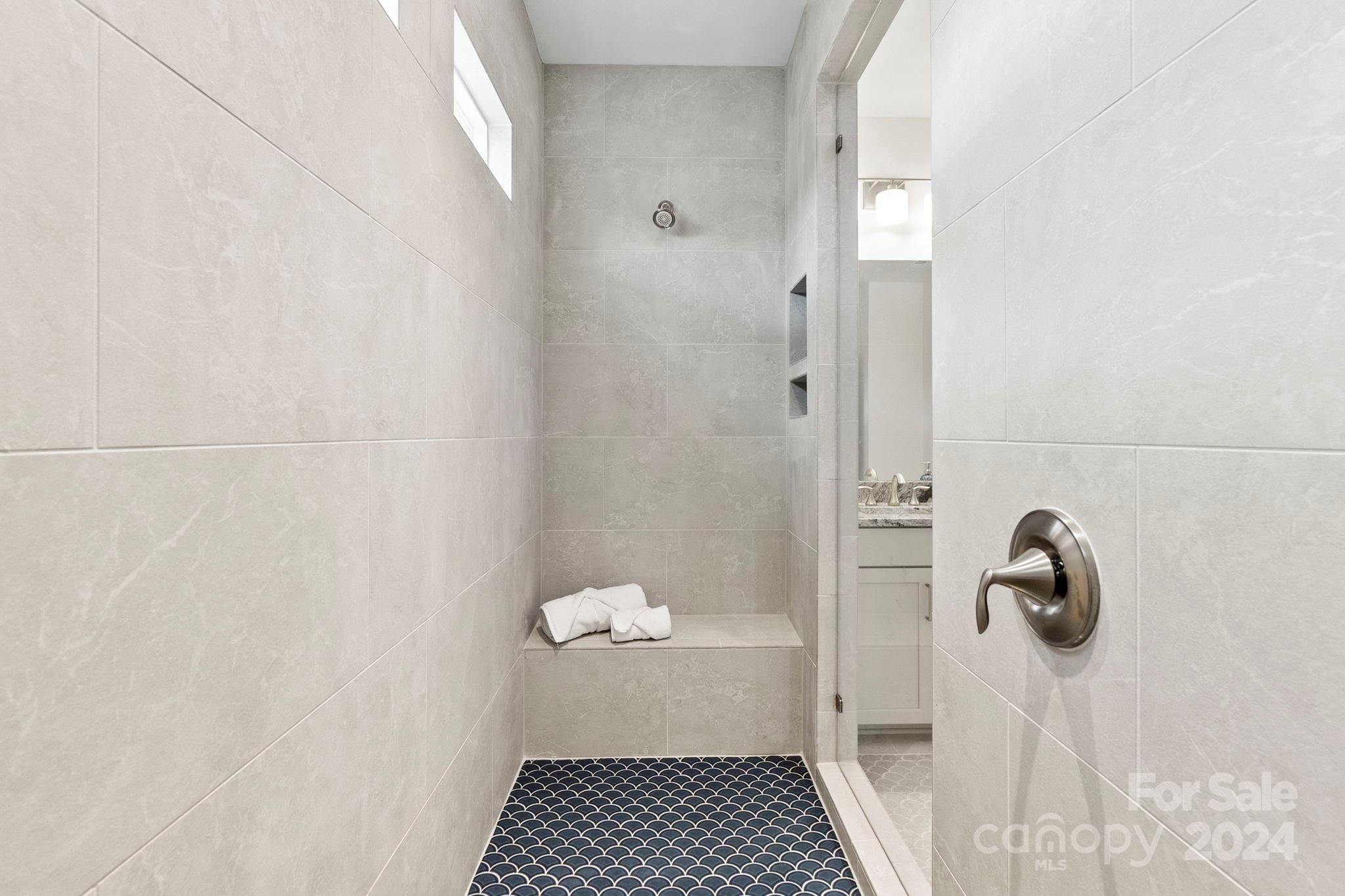 13228 Chopin Ridge Road Huntersville, NC 28078 - Photo 28 of 37 a bathroom with a shower