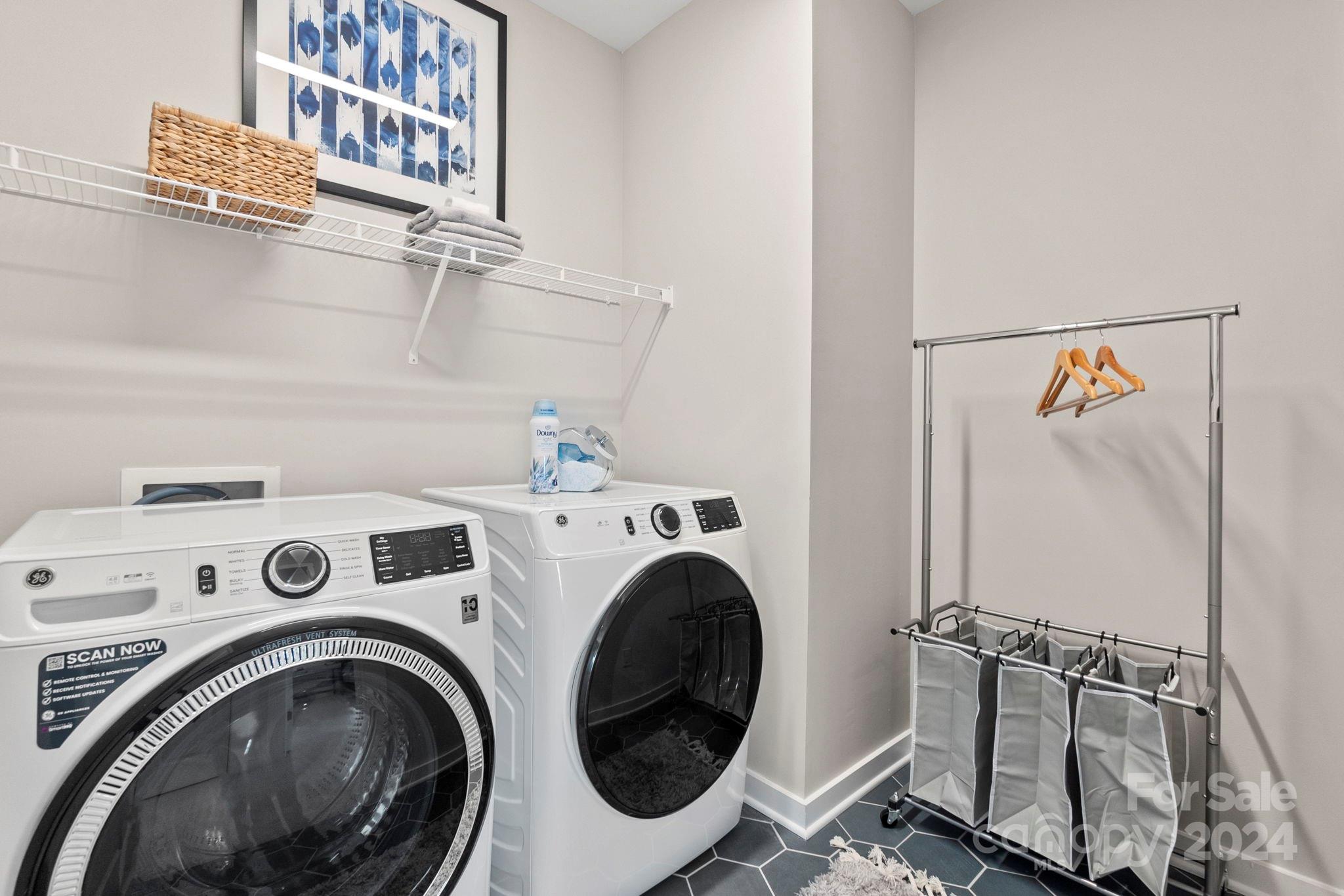13228 Chopin Ridge Road Huntersville, NC 28078 - Photo 29 of 37 a utility room with dryer and washer