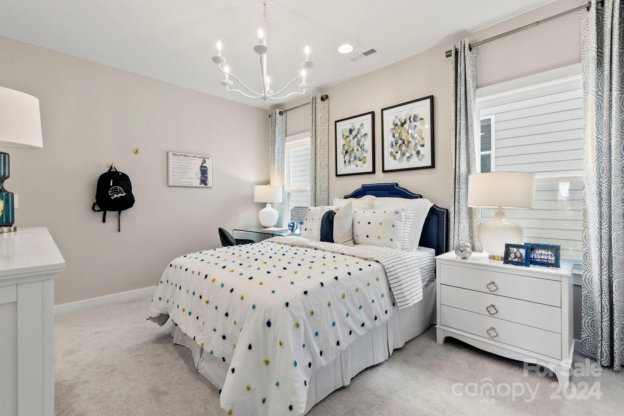 13228 Chopin Ridge Road Huntersville, NC 28078 - Photo 36 of 37 a spacious bedroom with a bed and window