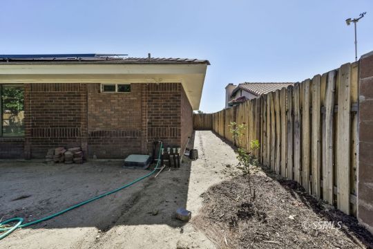 1257 Carolyn Street Ridgecrest, CA 93555 - Photo 41 of 42 a view of a pathway along the building