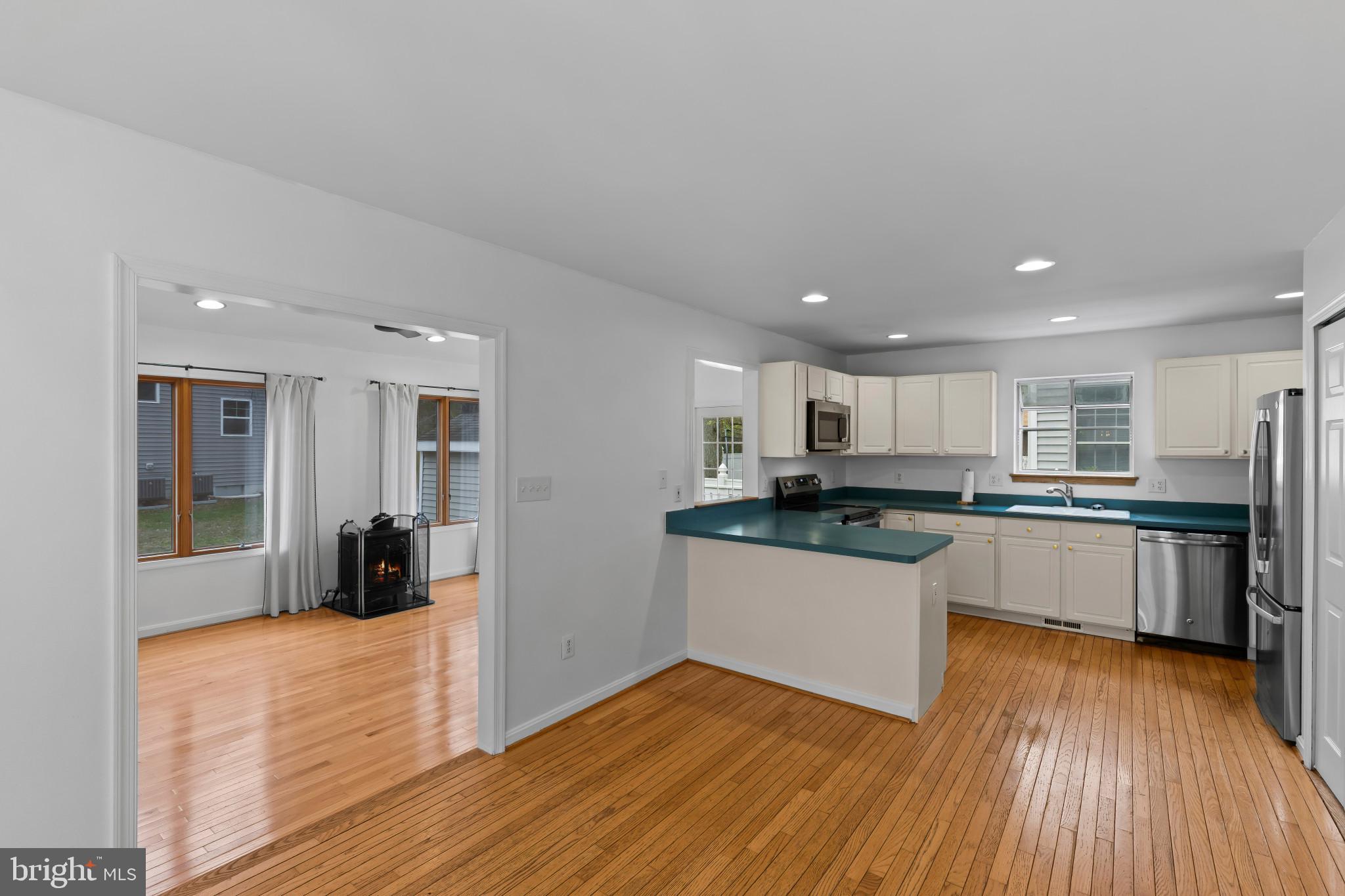 3530 Shady Drive Edgewater, MD 21037 - Photo 11 of 26 a kitchen with stainless steel appliances granite countertop a refrigerator a sink and a stove