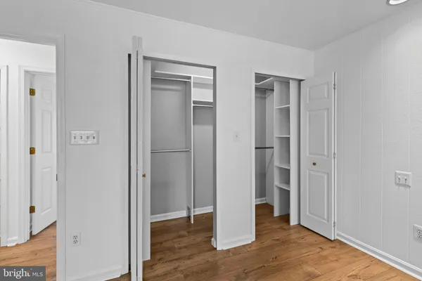 a view of entryway with wooden floor