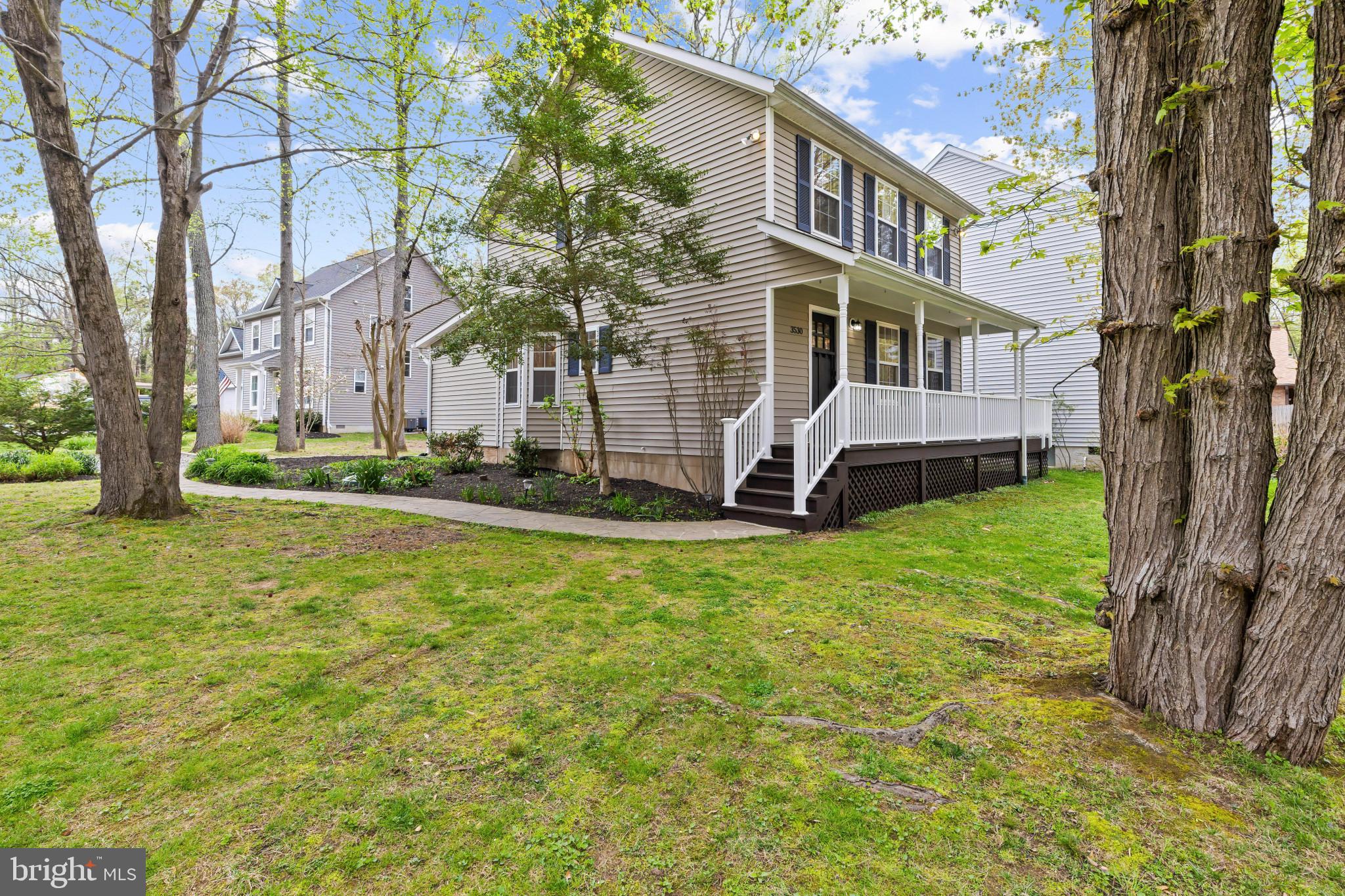 3530 Shady Drive Edgewater, MD 21037 - Photo 2 of 26 a view of a house with a yard