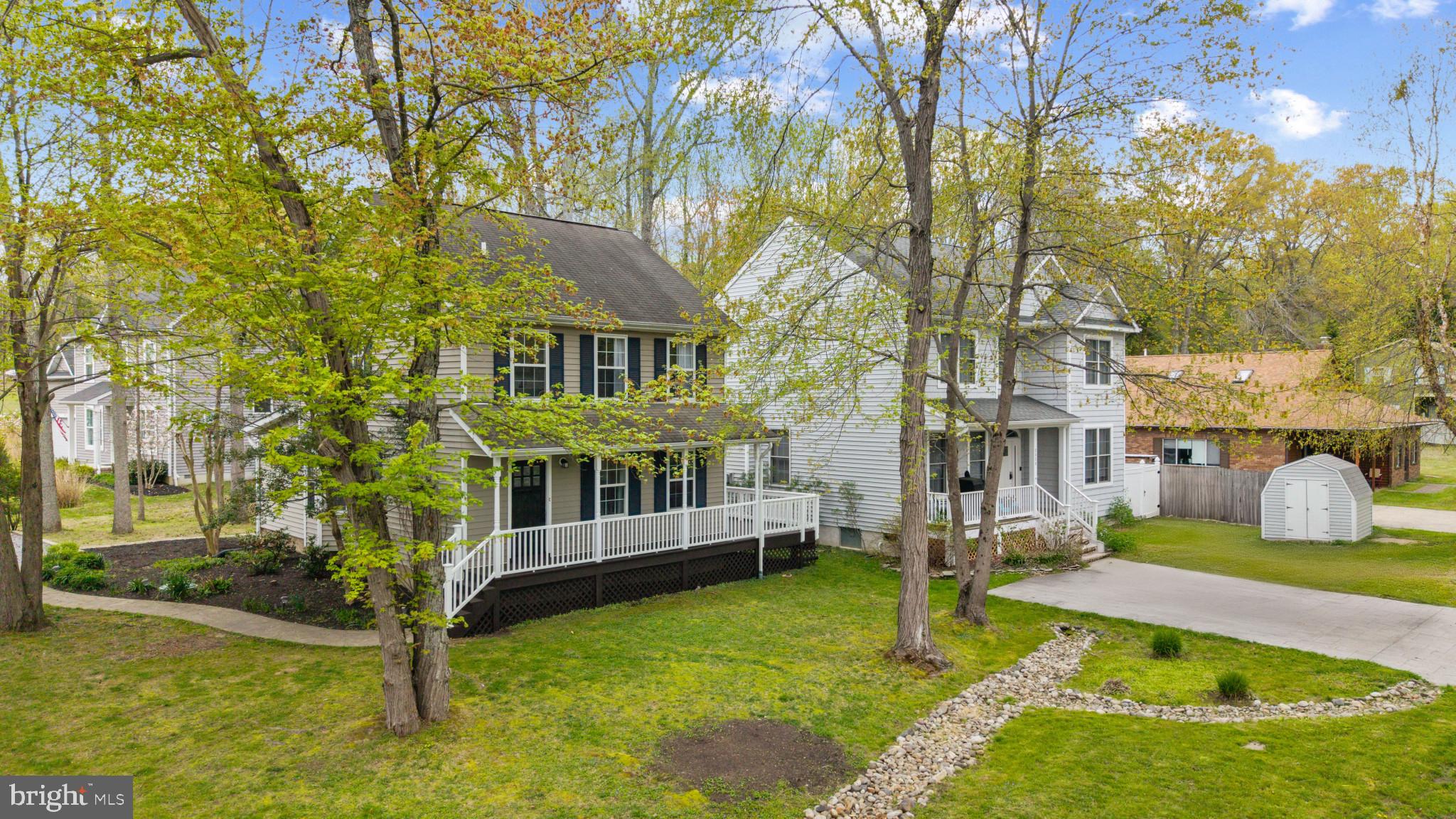 3530 Shady Drive Edgewater, MD 21037 - Photo 3 of 26 a view of a house with a yard