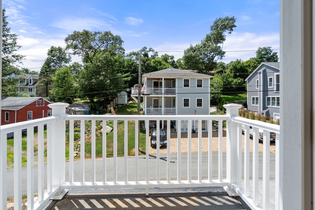 19 Brooks Road Gloucester, MA 01930 - Photo 17 of 32 a front view of a house with a porch