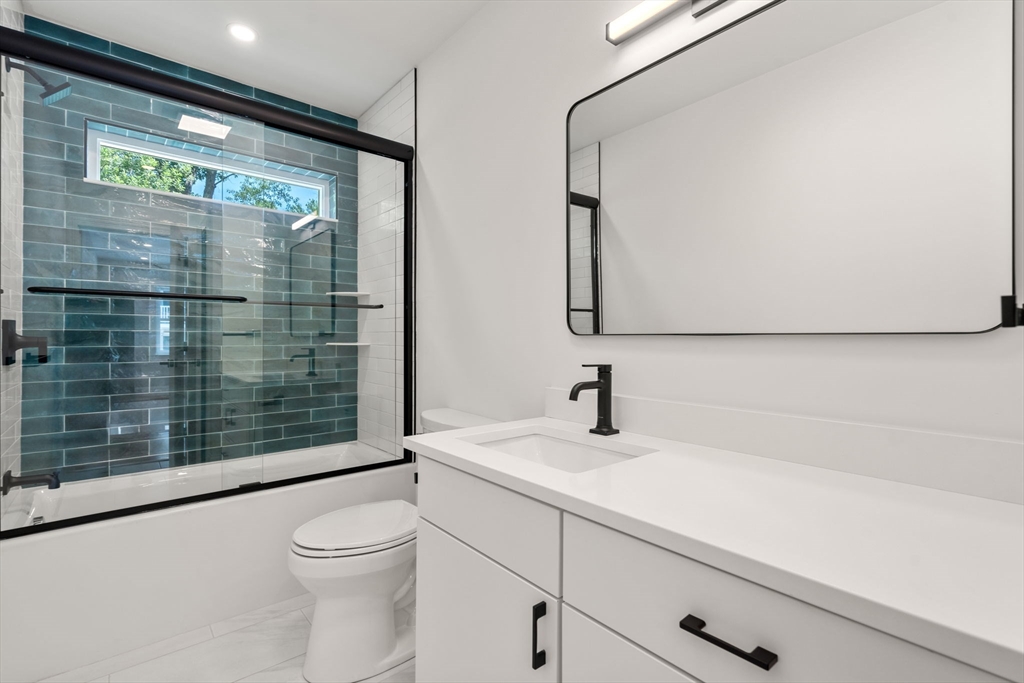 19 Brooks Road Gloucester, MA 01930 - Photo 18 of 32 a bathroom with a sink and a shower