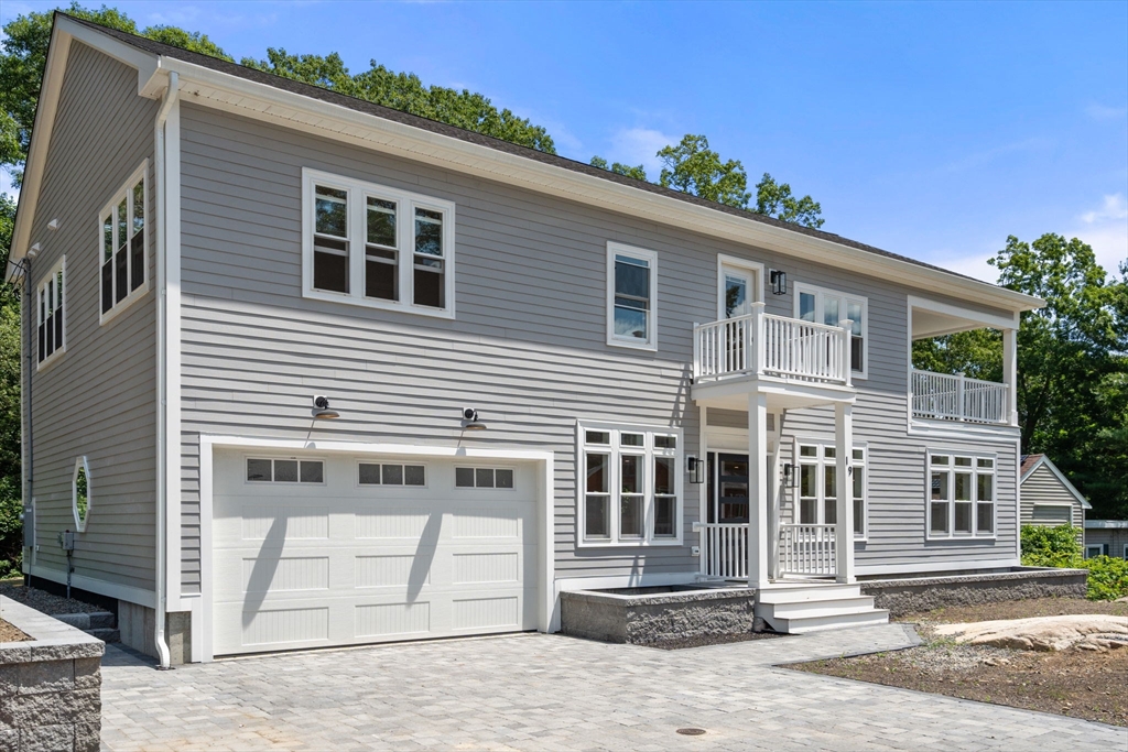 19 Brooks Road Gloucester, MA 01930 - Photo 27 of 32 a front view of a house with a porch