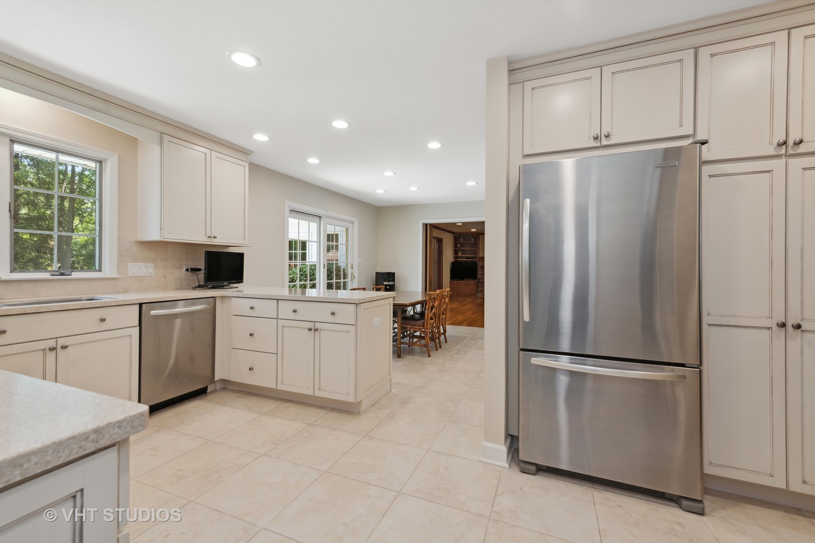 275 Old Mill Road Barrington, IL 60010 - Photo 11 of 45 a kitchen with white cabinets and stainless steel appliances