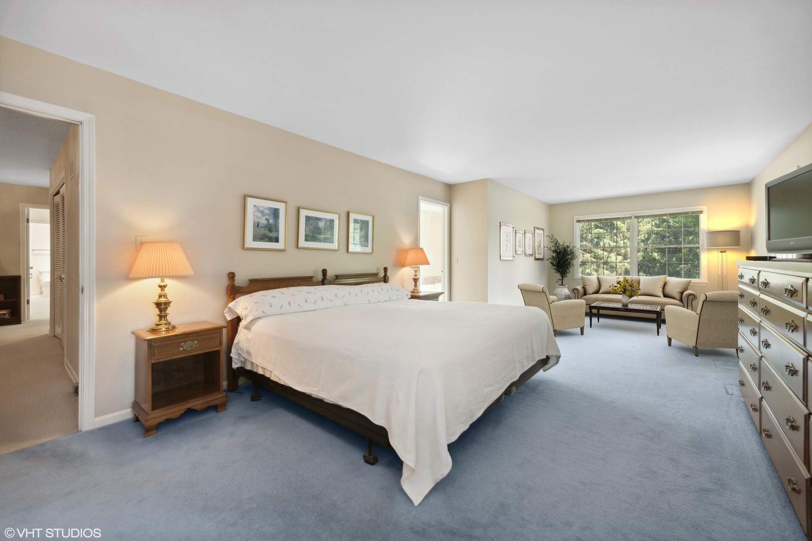 275 Old Mill Road Barrington, IL 60010 - Photo 18 of 45 a spacious bedroom with a bed couch and a window