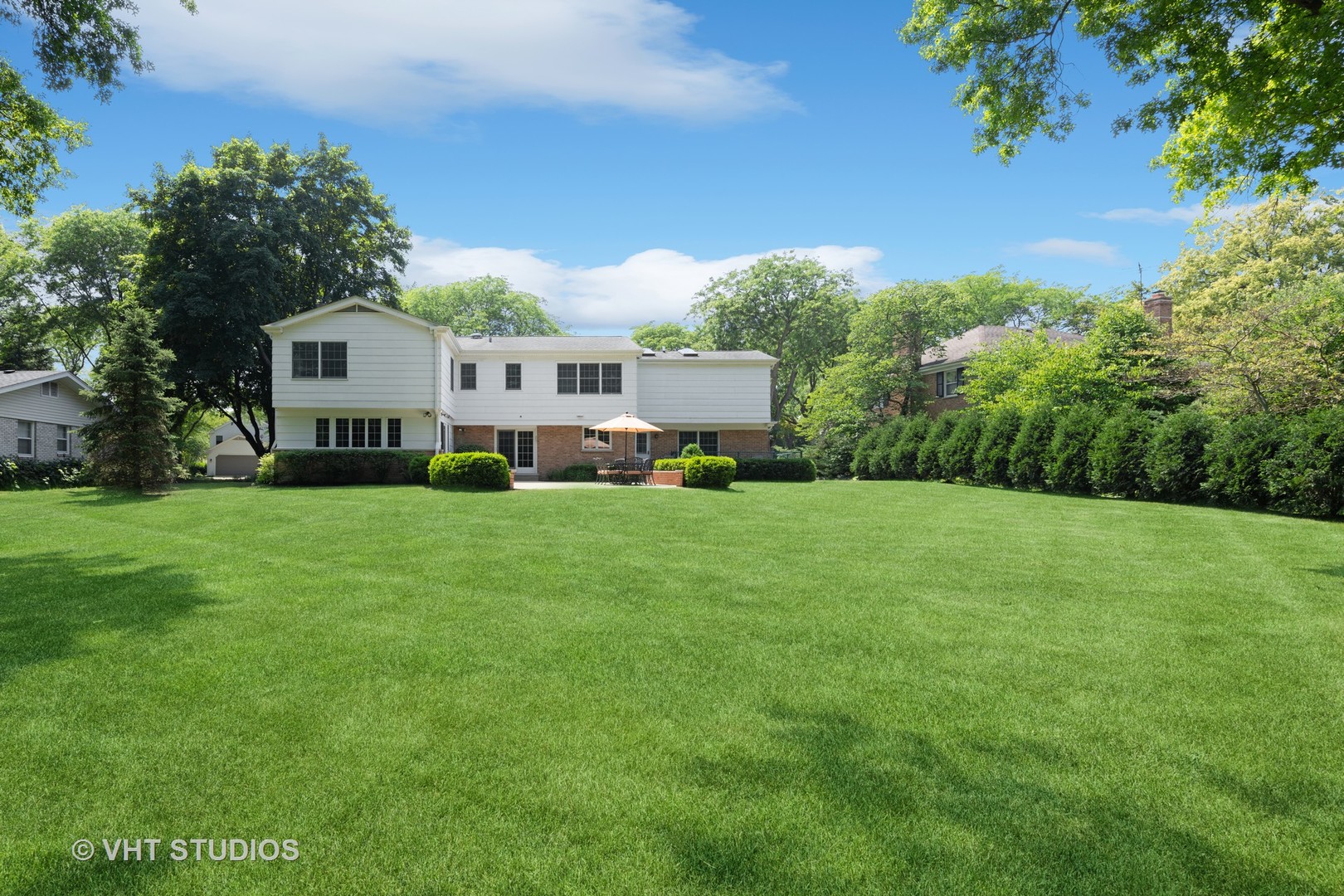 275 Old Mill Road Barrington, IL 60010 - Photo 40 of 45 a front view of a house with a yard and trees