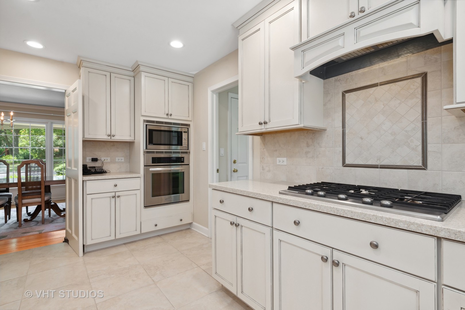 275 Old Mill Road Barrington, IL 60010 - Photo 9 of 45 a kitchen with white cabinets and appliances
