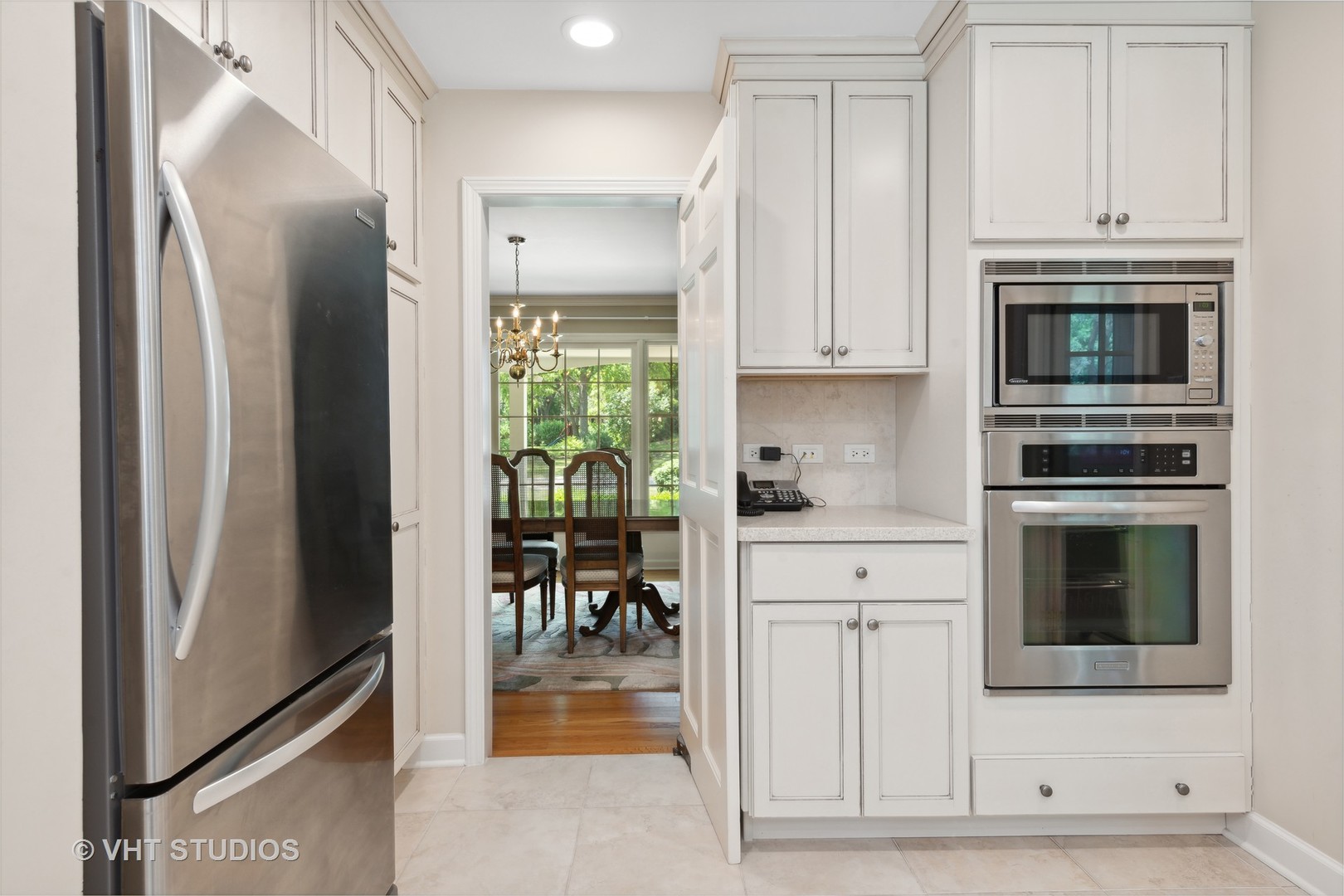 275 Old Mill Road Barrington, IL 60010 - Photo 10 of 45 a kitchen with stainless steel appliances granite countertop a refrigerator and a stove top oven
