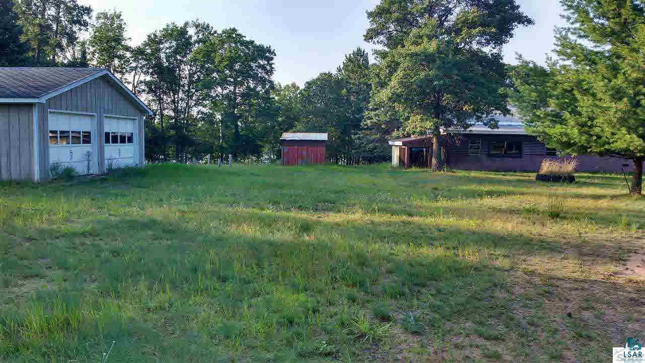 7496 Nancy Lake Road Minong, WI 54859 - Photo 1 of 19 Side Yard