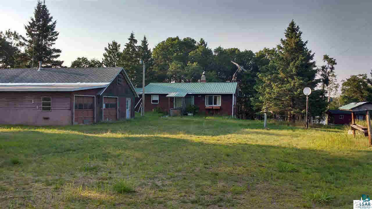 7496 Nancy Lake Road Minong, WI 54859 - Photo 12 of 19 Road side house and 1 of the 4 garages on property