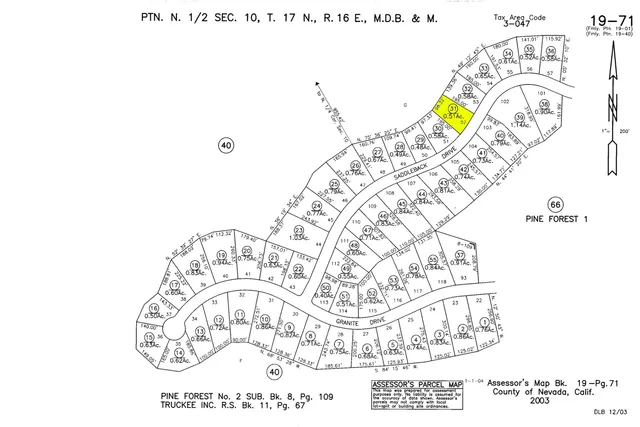 a black and white photo of a living room
