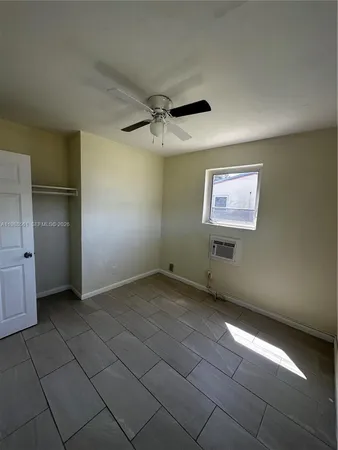 a view of a livingroom with furniture