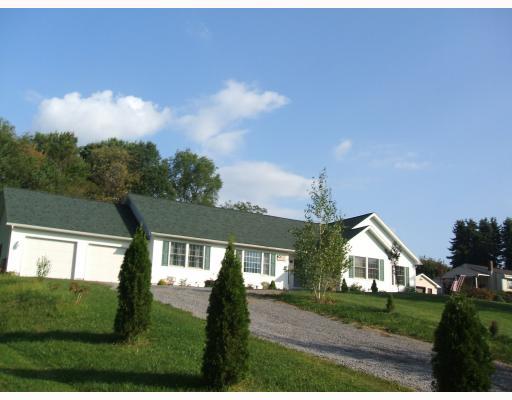 403 Parker Road Sarver, PA 16055 - Photo 1 of 18 Exterior Front. Immense....out of the ordinary. Stately 6 year old Ranch boldly situated up above road for privacy, beautiful scenic views. Perfection in one level living. Upscale poured concrete foundation by Holbein construction, with high basement ceilings.